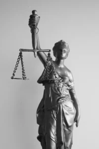 A statute of Lady Justice symbolising legal correctness and morality.