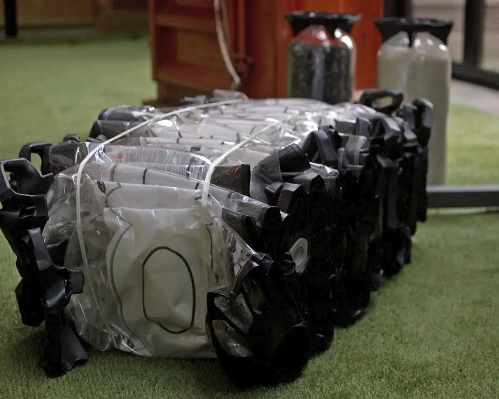 Baled single-use plastic kegs after use, highlighting packaging waste considered through Drinks industry B Corp support.